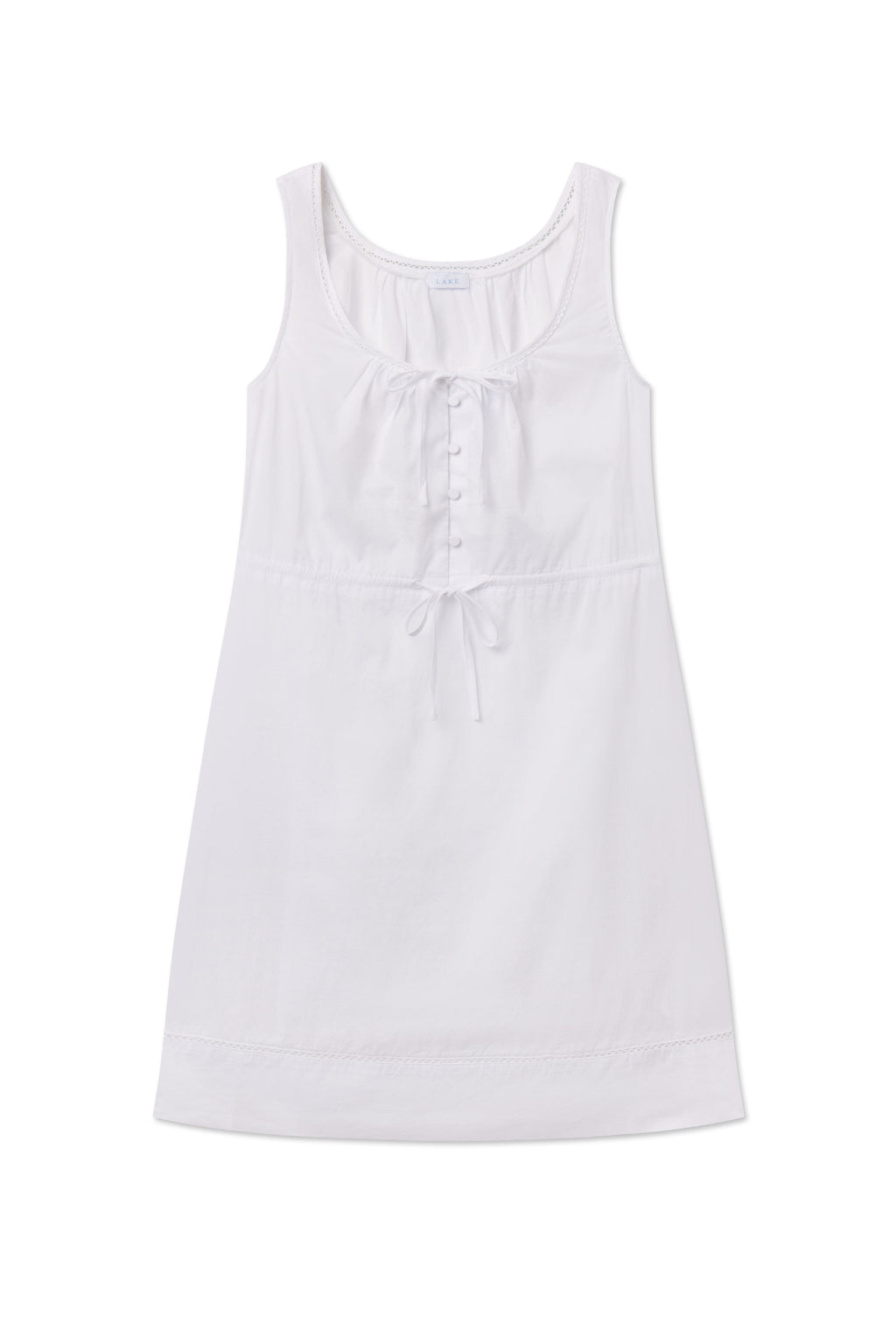 White sleeveless tank gown with scoop neckline, front button closure, and drawstring waist detail.
