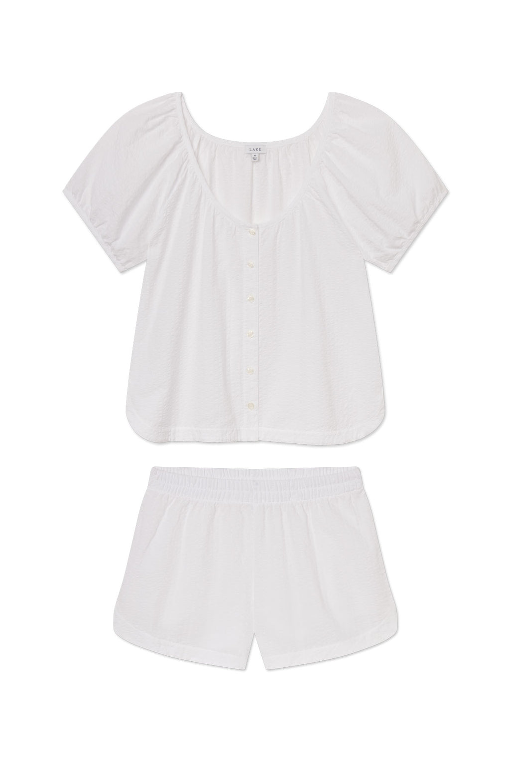Charlie Shorts Set in White Seersucker, featuring a button-front top and elastic-waist shorts made from lightweight fabric, showcased on a white background.