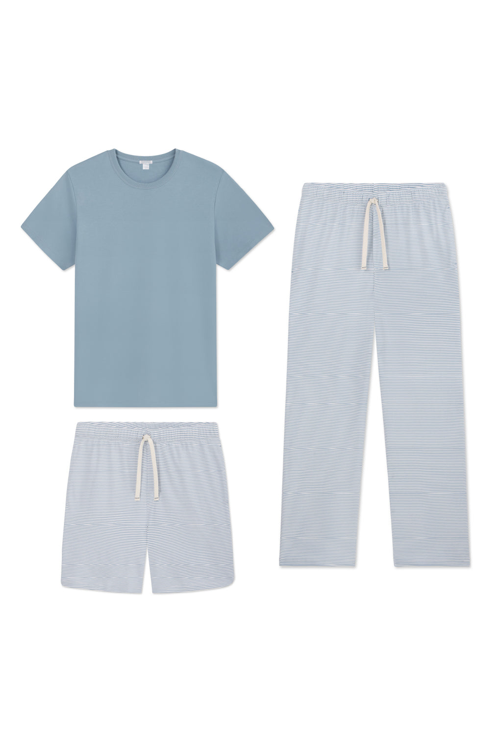 The Mens Pima Sleep Bundle in Anchor Blue includes a light blue short-sleeve tee, drawstring shorts, and pants—crafted from 100% Pima cotton and shown laid flat on a white background.