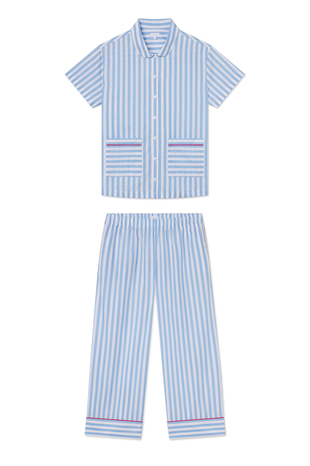 The Poplin Piped Short-Long Set in Baltic Blue Beam Stripe is a 100% cotton pajama set with light blue and white vertical stripes, a button-up collared top, two front pockets, and matching elastic waist pants with thin red and navy accents.