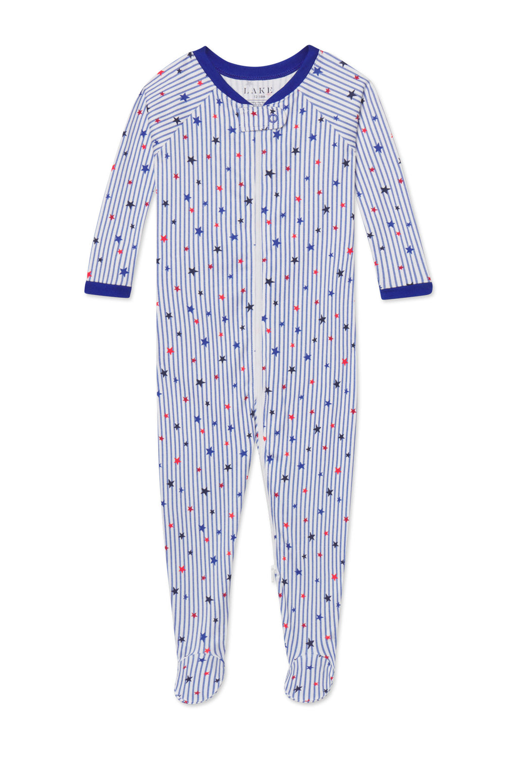 Infant one-piece sleeper with blue and red stars on white striped fabric and navy ribbed trim.