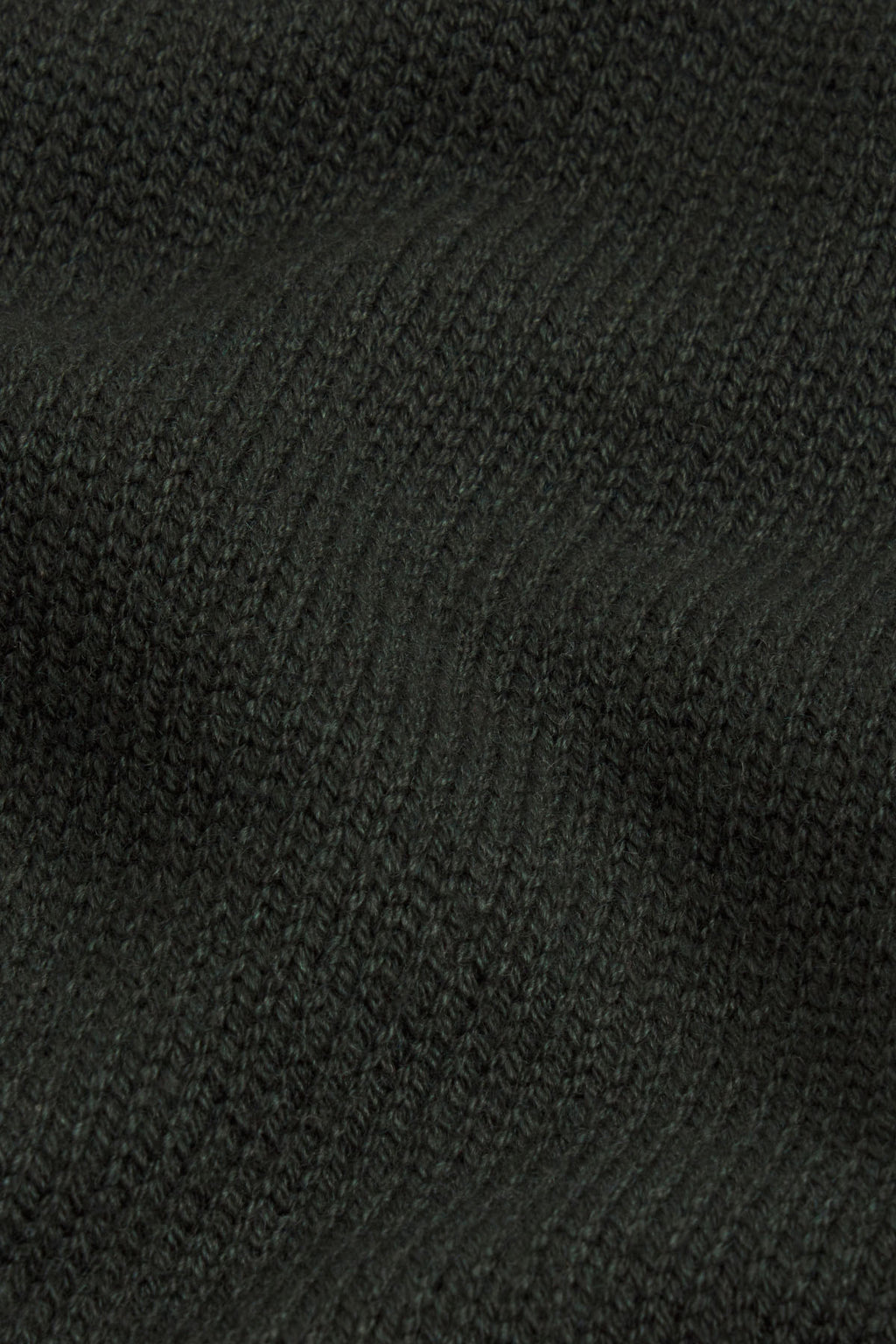 Rosemary knit fabric with textured cable pattern and diagonal weave detail.