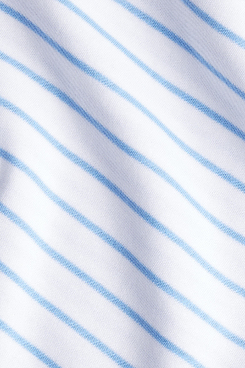 Soft white fabric with thin, light blue stripes and subtle texture, ideal for crafting the Pima Crew Short-Long Set in Baltic Blue or other luxurious Pima cotton apparel.