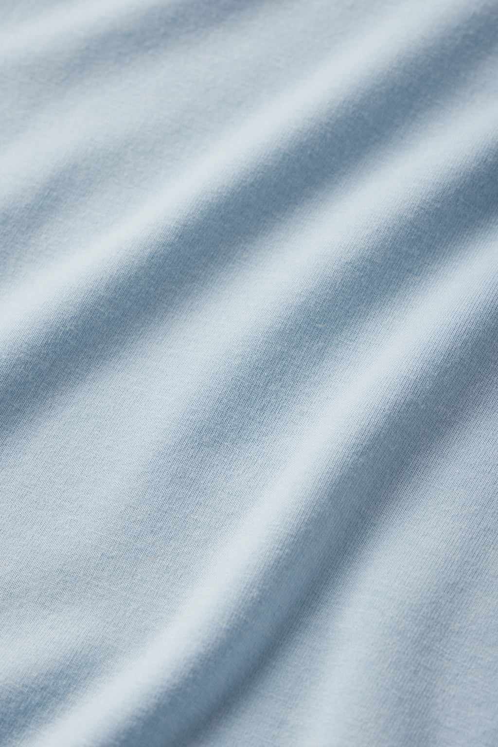 A close-up of the DreamModal Ribbon Short-Long Set in French Blue, featuring gentle, flowing folds and a softly smooth texture.