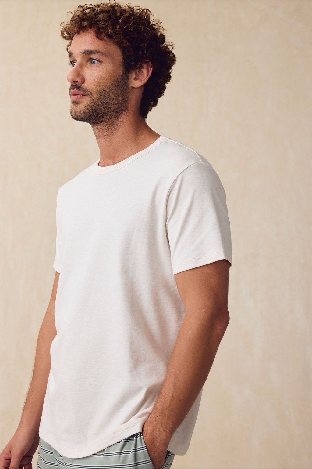 A bearded man wears the Men