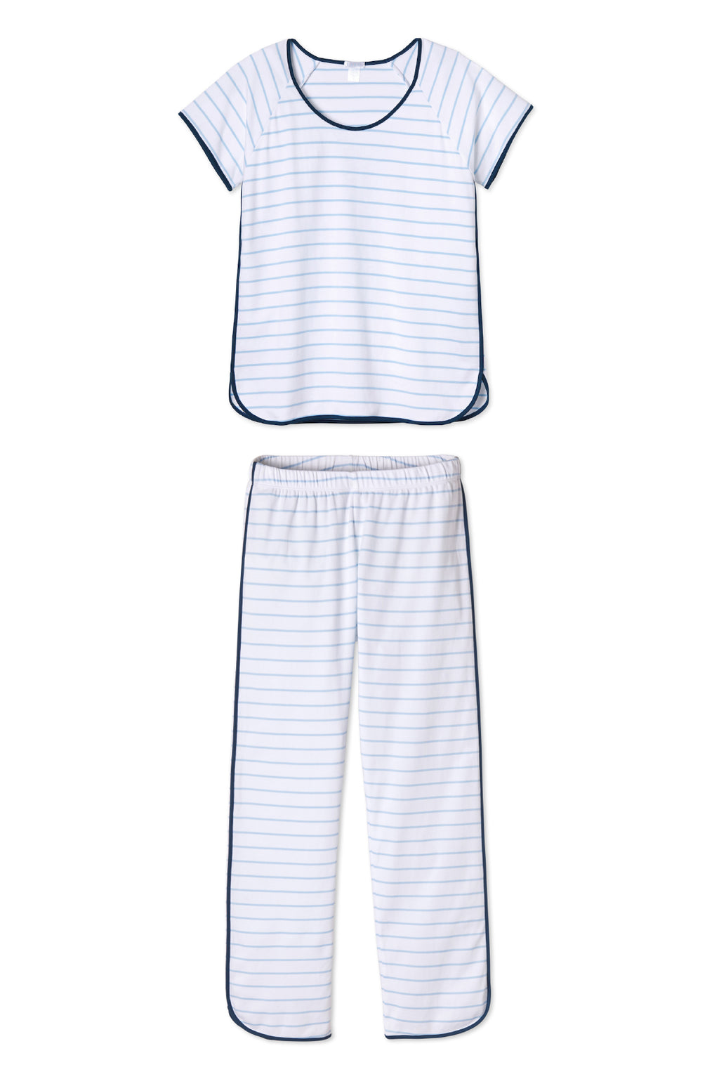 The Pima Short-Long Set in Marine is a women’s pajama set made from breathable Pima cotton, featuring a short-sleeve top and long pants in white with thin blue stripes and navy piping.